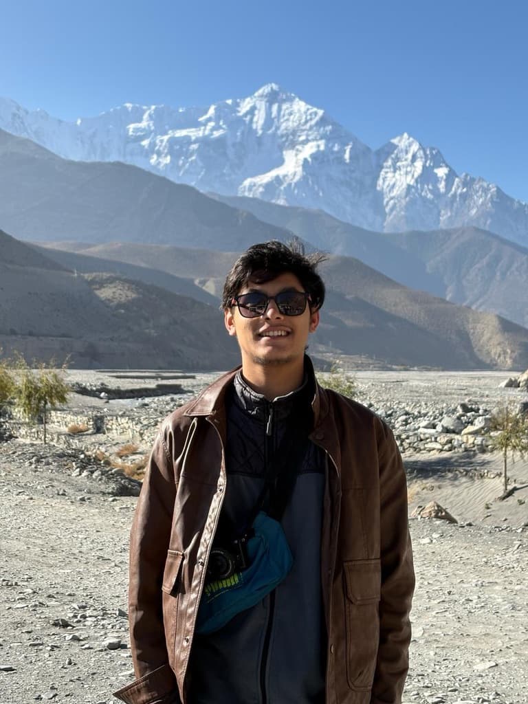 Sandesh Century standing in front of mountain scenery in Nepal
